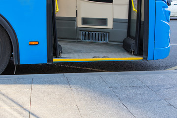 bus at the bus stop in the city center © Yuri Bizgaimer