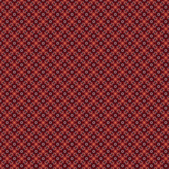 Red abstract textured pattern background made with parts of a red flower foliage