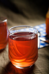 Cups of tea on the grunge background. Hot Tea in glass cup