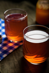 Cups of tea on the grunge background. Hot Tea in glass cup