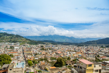 Fototapeta na wymiar Outdoor view of beautiful panoramic view of the city of Otavalo in Ecuador