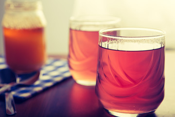 Cups of tea on the grunge background. Hot Tea in glass cup