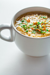 noodle soup in bowl. asian vegetable noudle soup. Vegetable soup on white background.