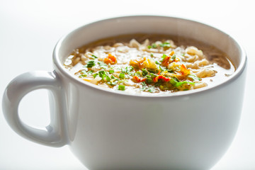 noodle soup in bowl. asian vegetable noudle soup. Vegetable soup on white background.