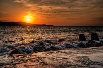 Fotobehang Dramatic sunset on the sea © Baronb