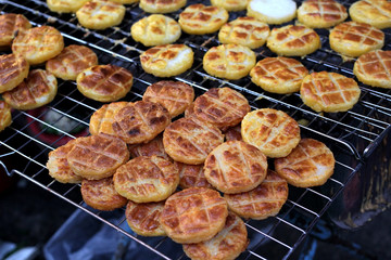 Thailand traditional food (Kgawhie) sticky rice with egg grilled on grilled