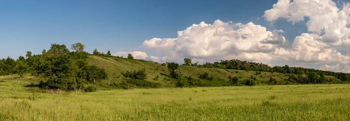 Rolling Hill and Clouds on Minnesota Prairie