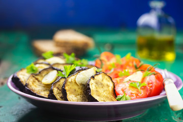 Aubergine, tomato, garlic salad