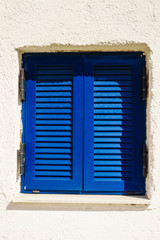 Greek blue window shutters