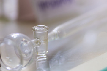 Flasks close up equipment in laboratory background