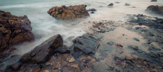 panorama of seascape with long exposure smooth flow water