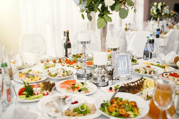 delicious dishes on the table in the restaurant. serving table.