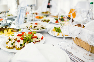 delicious dishes on the table in the restaurant. serving table.