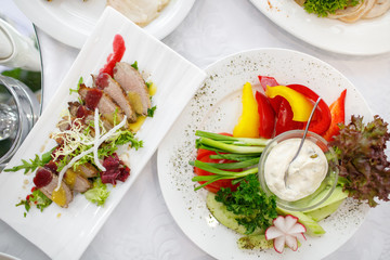 delicious dishes on the table in the restaurant. serving table.