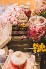 candy bar at a wedding filled with sweets and baubles