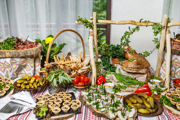 Obraz na płótnie Canvas Beautifully decorated catering banquet table with different food