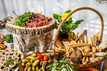 table with different type of snacks preparing for party.