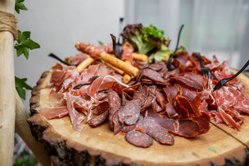 Salami, sliced ham, sausage, prosciutto, bacon. Meat antipasto p