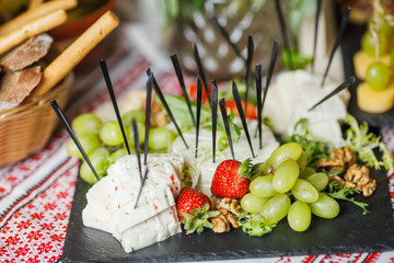 Beautifully decorated catering banquet table with different food