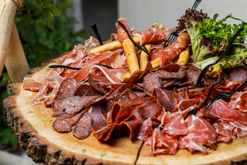 table with different type of snacks preparing for party.