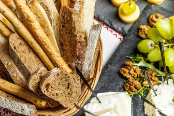 table with different type of snacks preparing for party.