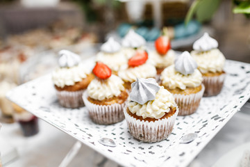 Dessert. Delicious cupcake on the table