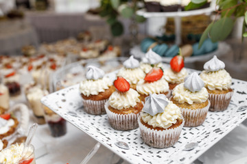 Dessert. Delicious cupcake on the table