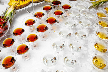 Fototapeta na wymiar Different glasses with alcohol whiskey and wine on the table at 