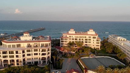 Lake Worth buildings and coastline, aerial view at dusk, Florida, USA