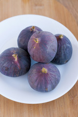 fresh figs on a white plate