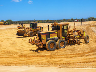 Heavy machineries working on large construction site