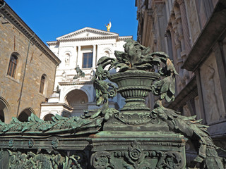 Obraz premium Bergamo, Italy.The old town. The facade of the Cathedral and the decorations of the gate of the Colleoni chapel