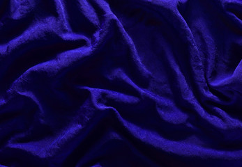 Blue silk texture. Wrinkle fabric background.