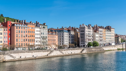 Obraz premium Vieux-Lyon, beautiful facades on the quay, colorful houses in the center, on the river Saone, panorama 