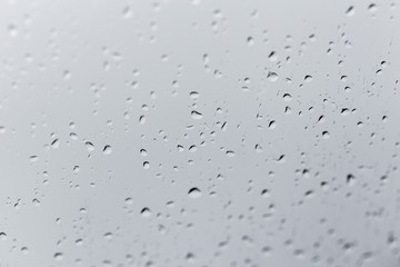 Many water drops texture on an abstract grey background