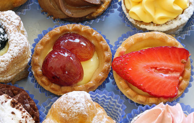 Macro photography of pastries made with custard and fruits