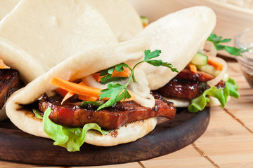 Gua bao, steamed buns with pork belly and vegetable