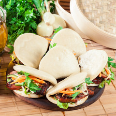 Gua bao, steamed buns with pork belly and vegetable