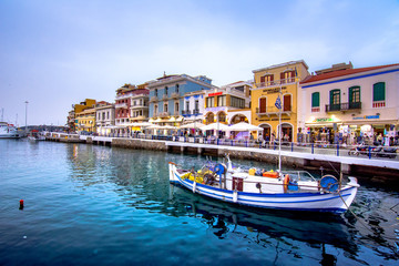 Fototapeta na wymiar Agios Nikolaos, a picturesque coastal town with colorful buildings around the port in the eastern part of the island Crete, Greece