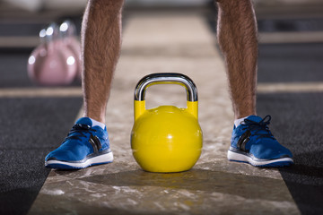 man exercise with fitness kettlebell