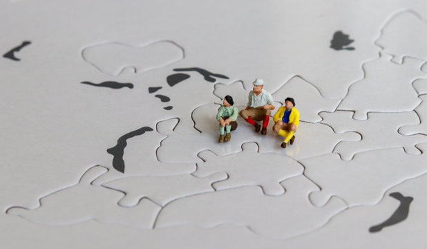 Miniatures on the world map puzzles.
