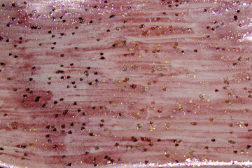 Pink shiny paint with heart sequins background