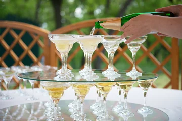 Foto op Plexiglas anti-reflex Festive table setting wineglasses with champagne © MIRACLE MOMENTS