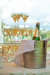 Deurstickers Festive table setting wineglasses with champagne © MIRACLE MOMENTS