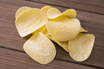 chips with wooden background