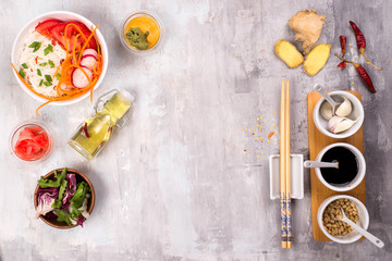 Spicy glass noodles with vegetables - carrots, cucumber, peppers, garlic.