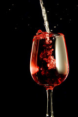 wine glass in black background