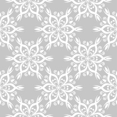 White flowers on gray background. Ornamental seamless pattern
