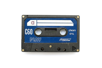 Vintage audio cassette tape isolated white background Compact cassette for play and recording analog music in 80s Nostalgic and obsolete instrument to listen music Music collectors love these objects
