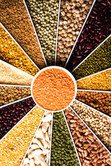 Indian Beans,Pulses,Lentils,Rice and Wheat grain in a white Sunburst or sun rays shape designer...
